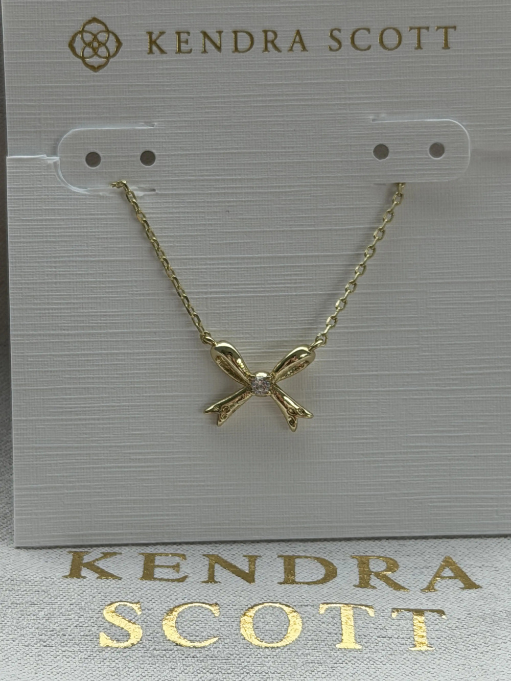 Kendra Scott gold bow necklace